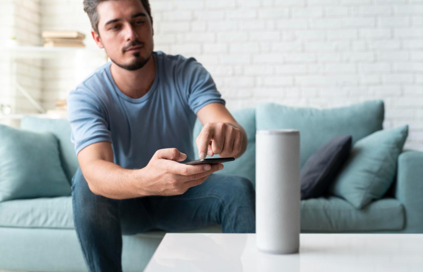 Man using speaker - digital assistant