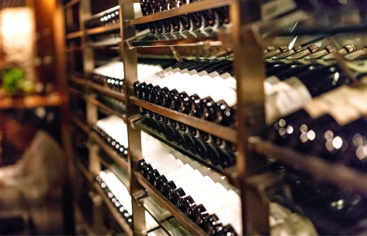 Bottles of wine arranged on a shelf